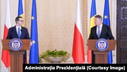 Premierul Poloniei Mateusz Morawiecki și președintele Klaus Iohannis la declarația de presă comună de la Palatul Cotroceni.
