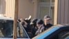 Policija provodi Binalija Čamgoza u ured tužioca, Podgorica, januar 2024.