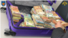 Valiză cu 550.000 de euro cash găsită asupra unui bărbat care a vrut să intre din România în Republica Moldova, pe 5 octombrie 2023.