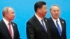 Oficialii chinezi au spus la început că protestele fără precedent din Kazahstan sunt o afacere internă.