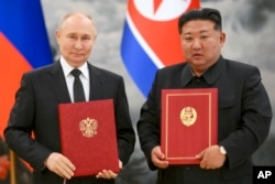 Путін і Кім Чен Ин під час підписання угоди про стратегічну співпрацю. КНДР, 19 червня 2024 року
