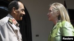 Egypt's military chief, Field Marshal Hussein Tantawi (left), meets with U.S. Secretary of State Hillary Clinton in Cairo on July 15.