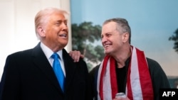 Američki predsednik Donald Tramp dočekuje američkog nastavnika i bivšeg pritvorenika Marka Fogela u Beloj kući pošto je 11. februara oslobođen iz Rusije.