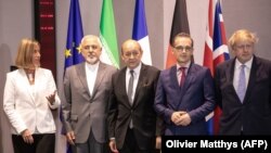 Zvaničnici EU sa šefom diplomatije Irana na jednom sredinom maja u Briselu