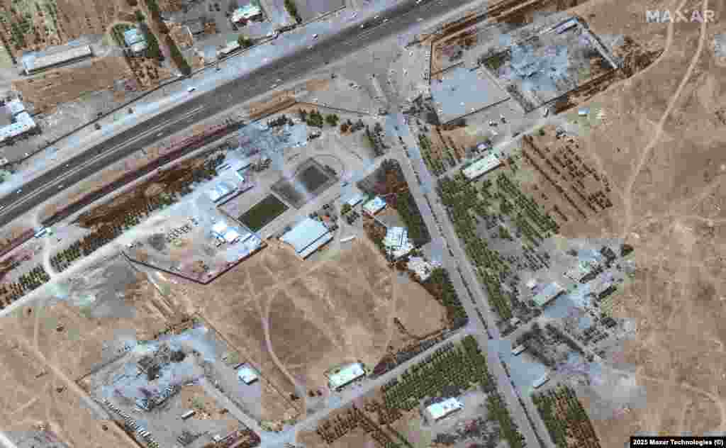 Destroyed buildings around the entrance to the facility in Kermanshah.