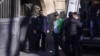 Șase persoane acuzate de trădare au fost reținute joi de procurori.