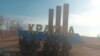Fotografija koju je 12. februara 2023. objavila press služba Jevgenija Prigožina, prikazuje, kako se kaže, Wagnerove lovce kako poziraju na ulazu u selo Krasna Hora, u blizini ratom pogođenog grada Bakhmuta.