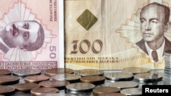 Bosnia-Herzegovina -- Convertible mark banknotes and coins are pictured in Zenica, 20Jan2011