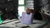 AFGHANISTAN -- An Afghan man casts his vote during the Parliamentary elections in Kandahar, Afghanistan, 27 October 2018.